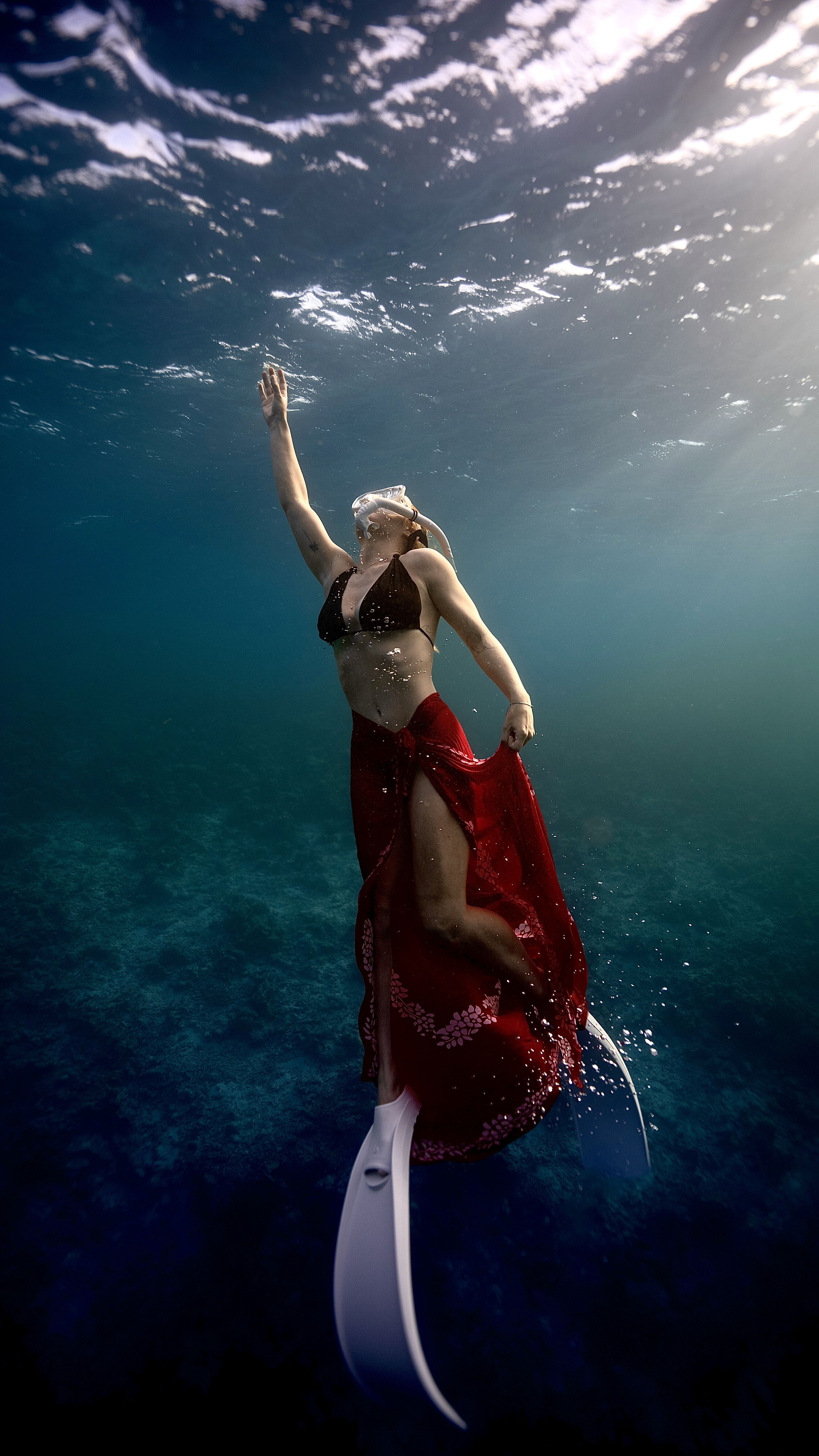 Divers exploring a Maldivian reef